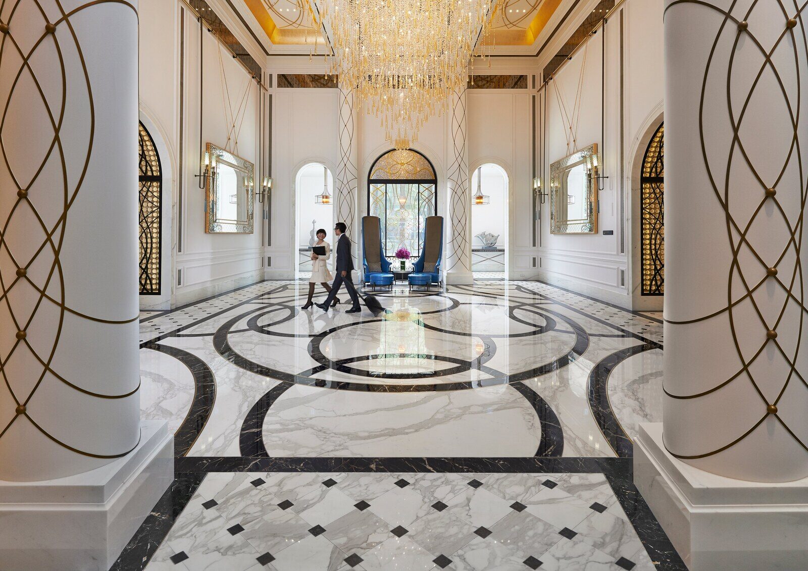 The high-ceilinged lobby and crystal chandelier of Mandarin Oriental, Taipei