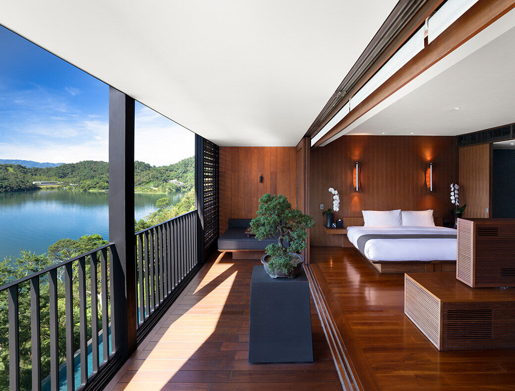 The balcony of a Lakeview Suite at The Lalu, Sun Moon Lake, with the lake beyond